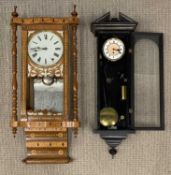 TWO WALL CLOCKS comprising ebonised Vienna type and a 'Jerome New Haven, USA' marquetry with