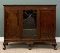 MAHOGANY THREE DOOR BOOKCASE with glazed centre, raised on cabriole supports, 132 (h) x 155 (w) x