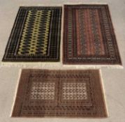 THREE PERSIAN WOOL RUGS 168 x 95cms the largest Provenance: private collection Anglesey