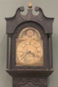 LATE 18TH / EARLY 19TH CENTURY OAK LONGCASE CLOCK, ebonised and heavily carved case, brass dial with