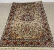 PERSIAN WOOLLEN RUG of cream ground, multi-bordered with floral pattern throughout, 252 x 156cms