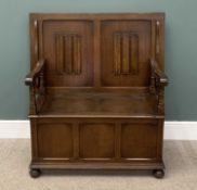 POLISHED MONK BENCH with linen fold to rear, 112 (h) x 107 (w - open) x 50cms (d) Provenance: