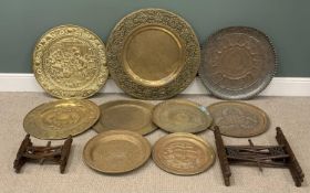SEVEN VARIOUS METAL PLAQUES including Cairo-ware, with two associated wooden stands Provenance: