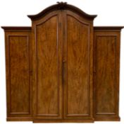 GOOD VICTORIAN FLAME MAHOGANY TRIPLE WARDROBE being a fine example having dome top and a centre