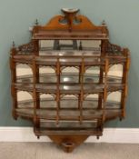 HIGHLY ORNATE EDWARDIAN MAHOGANY WALL ETAGERE of architectural form having fretwork galleries,