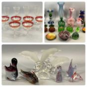COLLECTION OF DECORATIVE GLASSWARE including vases, lidded container, paperweights etc.