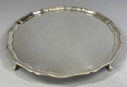 GEORGE VI CIRCULAR SILVER SALVER with bead moulded rim, on claw and ball feet, Birmingham 1939,