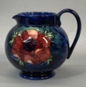 MOORCROFT PEONY PATTERN JUG, 12cms (h) with impressed marks and original paper label Provenance: