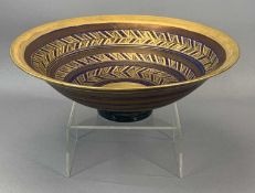 MARY RICH STUDIO POTTERY BOWL, decorated in blue, gold and copper lustre with geometric bands,