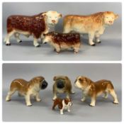 GROUP OF CERAMIC ANIMAL FIGURES including two large Melba Ware bulls, 25cms (h), a smaller bull,