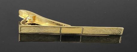 9CT GOLD TIE CLIP with textured finish, 6cms (l), 6.3gms Provenance: private collection Conwy