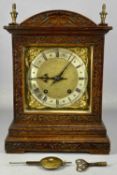 WALNUT MANTEL CLOCK by Winterhalder and Hofmeier, carved decoration to case, 8 day movement striking