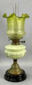 ART NOUVEAU OIL LAMP with floral painted opaque glass reservoir, embossed brass column and black