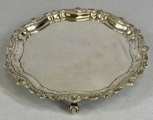 GEORGE VI CIRCULAR SILVER CARD TRAY, shell moulded rim on four scroll feet, Birmingham 1942, J. B.