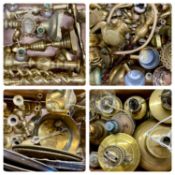 BRASSWARE, a large collection including candle sticks, oil lamps, plaques, weights and other