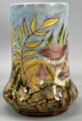 COBRIDGE STONEWARE VASE of cylindrical form with flared base, decorated with fungus and ferns,