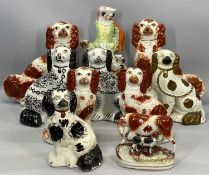 GROUP OF 19TH CENTURY STAFFORDSHIRE FIGURES including various seated spaniels, 31cms (h) the
