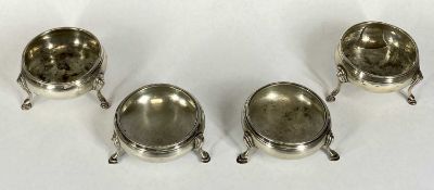 GEORGIAN CIRCULAR SILVER OPEN SALTS, two pairs, on hoof feet, 6cms (diam.), one pair hallmarked