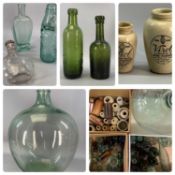 COLLECTION OF ANTIQUE GLASS AND STONEWARE BOTTLES including a green glass carboy, 54cms (h)