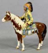 A BESWICK FIGURE OF A NATIVE AMERICAN CHIEF riding a skewbald horse, Model No 1391, printed marked