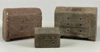 THREE WELSH FOLK ART CARVED SLATE DOORSTOPS in the form of bureau chests, handles absent, 15.5 (