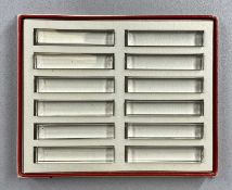 BACCARAT TWELVE PLAIN RECTANGULAR CLEAR GLASS KNIFE RESTS each 8cms (l) and signed 'Baccarat',