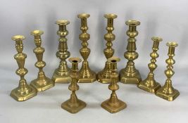 FIVE PAIRS OF BRASS CANDLESTICKS and many other odds Provenance: private collection Conwy