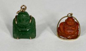 TWO SMALL BUDDHA PENDANTS with yellow metal mounts, one jadeite, one coral Provenance: private