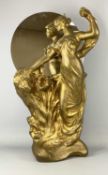 ART DECO STYLE GILDED PLASTER FIGURE of classical female and flowers with a circular mirror at the