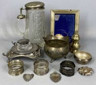 WHITE METAL AND NIELLO CIRCULAR POT with shaped rim, body decorated with a riverscape on three