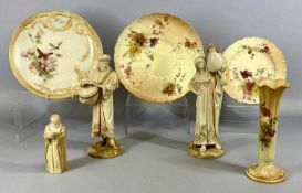 ROYAL WORCESTER BLUSH IVORY, male and female water carriers, no. 1250, 25cms (h), friar reading