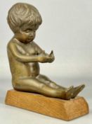 20TH CENTURY BRONZE SCULPTURE of a seated child with cupped hands on a rectangular oak plinth, 22cms