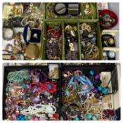 LARGE COLLECTION OF COSTUME JEWELLERY including gold tone bangles and brooches, bead necklaces,