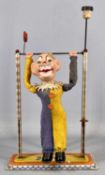 ARNOLD TIN PLATE 'JIMMY THE ACROBAT CLOWN', 1950s mechanical tin plate toy with composition head,