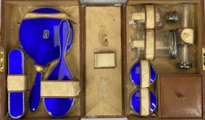 TRAVELLING VANITY CASE with silver and cobalt blue guilloche enamel contents, Birmingham 1928, to