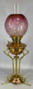 ARTS & CRAFTS BRASS AND COPPER OIL LAMP with open framework, Hinks burner, globular etched pink