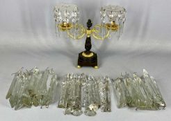 FRENCH BRONZE & ORMOLU TWIN BRANCH CANDLE HOLDER with cut glass sconces and drops, 24cms (h) and a