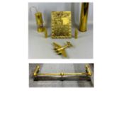 19TH CENTURY CAST IRON & TUBULAR BRASS FIRE CURB, 127cms (w), brass shell case, 44cms (h) and