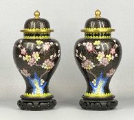 PAIR OF 20TH CENTURY CLOISONNE VASES of baluster form, decorated with blossom on black ground with