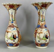 PAIR OF TALL 19TH CENTURY JAPANESE VASES, slender baluster form, flared crimped rims painted with