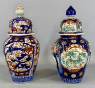 TWO JAPANESE IMARI BALUSTER VASES WITH COVERS, Meiji period, traditional decoration, 34cms (h)