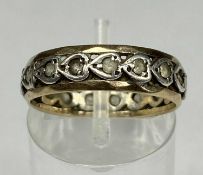 9CT GOLD & SILVER CELTIC DESIGN ETERNITY RING, size O, 2.6gms Provenance: private collection Ynys