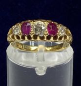 18CT GOLD RING SET WITH BAND OF THREE DIAMONDS & TWO RUBIES, size K-L, 3gms Provenance: deceased