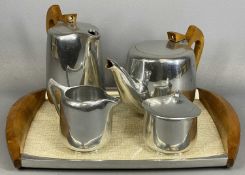 PICQUOT WARE POLISHED ALUMINIUM TEA SERVICE including teapot, hot water jug, lidded sugar basin,
