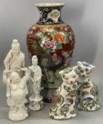 CHINESE FAMILLE NOIR BALUSTER VASE decorated all over with flowers and birds, 38cms (h), pair of