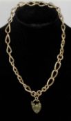 9CT ROSE GOLD BROAD LINK CHAIN, each link hallmarked and with heart shaped padlock, 34cms (l), 39.
