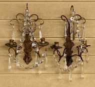PAIR OF METAL TWIN BRANCH WALL SCONCES with clear cut glass drops, 34 x 23cms Provenance: private