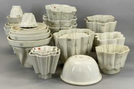 LARGE & VARIED ASSORTMENT OF CREAM CERAMIC JELLY MOULDS including Shelley Provenance: private