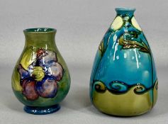 MINTON 'SECESSIONIST' BOTTLE SHAPED VASE, turquoise/green ground with tube lined stylised floral