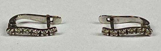 PAIR OF 18CT WHITE GOLD DIAMOND SET CUFF EARRINGS, 1.5gms Provenance: private collection Conwy